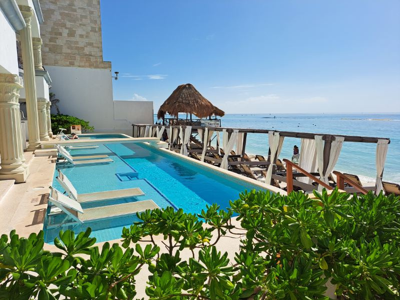 Luxury beachfront resort vacations for retirees with pool and ocean views